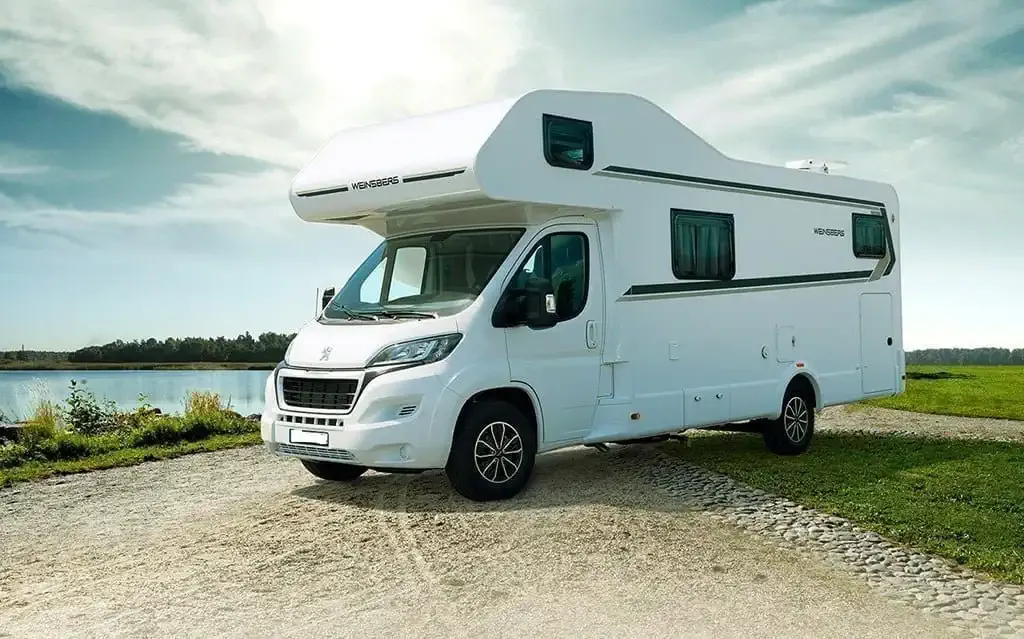 Caravan by a lake